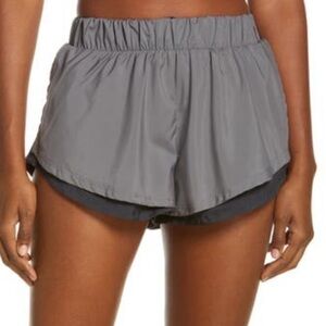 Free People size S grey & black Run For It 2” inseam shorts elastic high waist